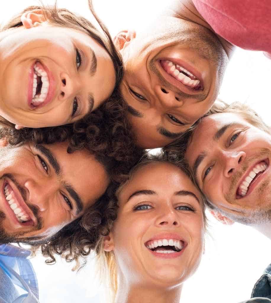 Smiling person showcasing white teeth after laser whitening treatment Marlow